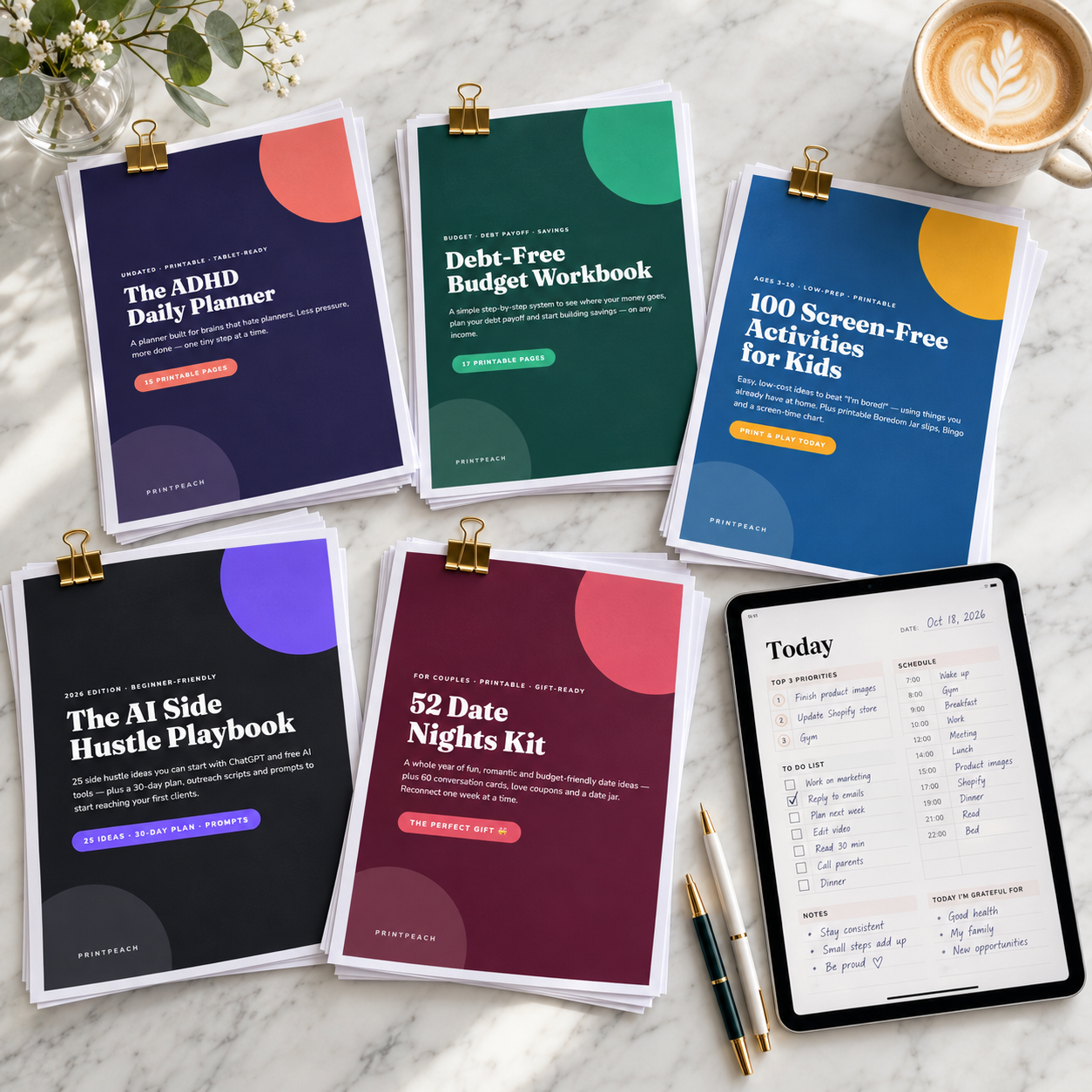 Printpeach printable guides as loose printed pages on a desk